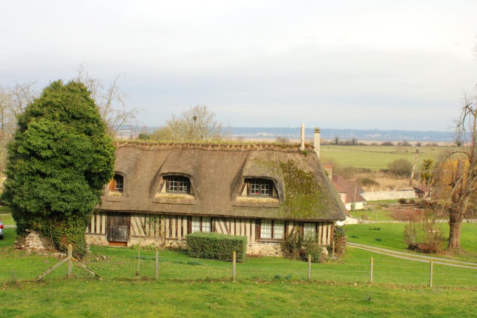 A typical Norman half-timbered house in teh countryside of Pays d'Auge Normandy