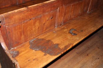 Bloodstains on the pews of Angoville au Plain church, Normandy