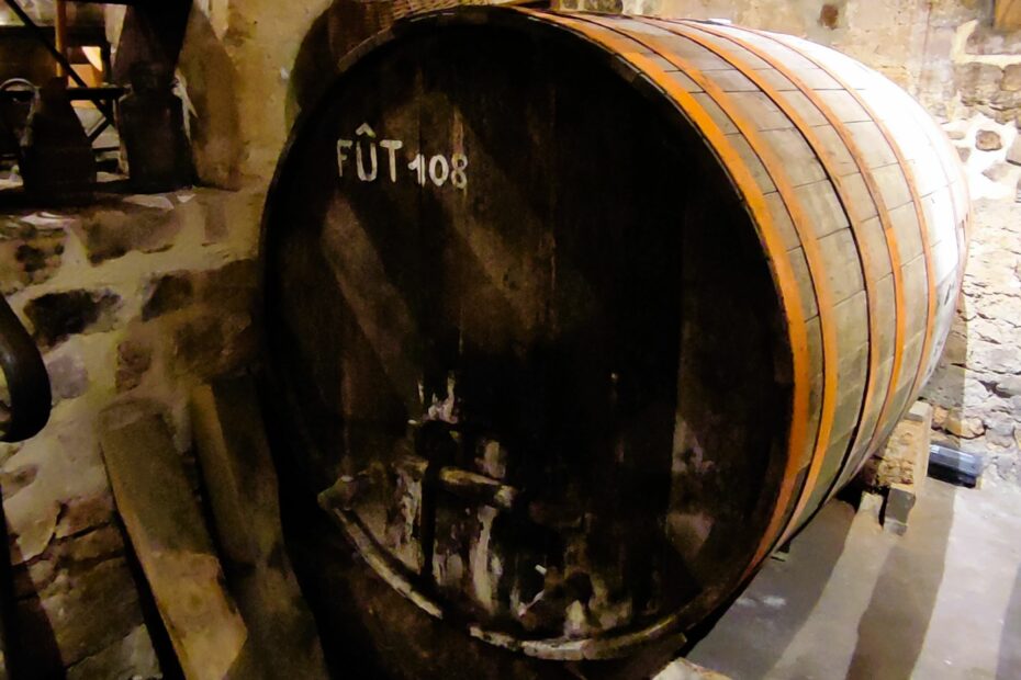 An old barrel at La sapinière cider farm on Omaha Beach in Normandy