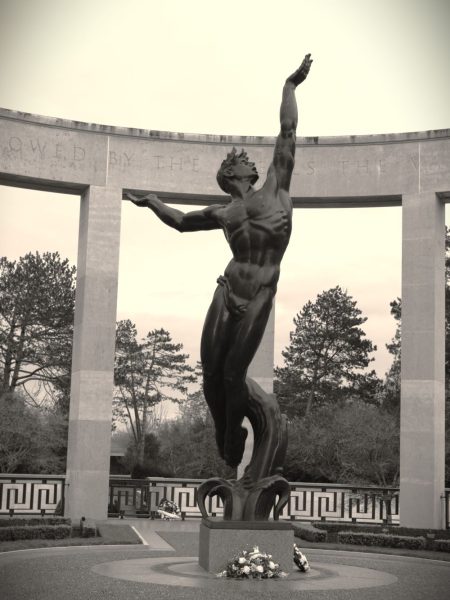 Statue The spirit of American youth rising from the waves at the US cemetery, Omaha Beach, Normandy